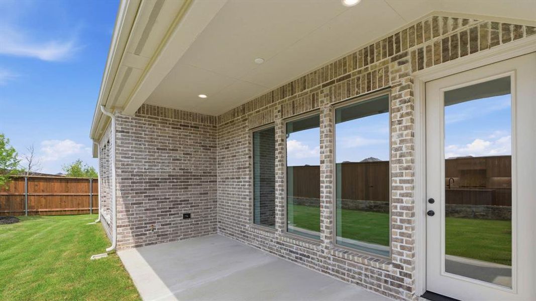 Exterior details and patio area of a home in M3 Ranch, Mansfield (Image 3).
