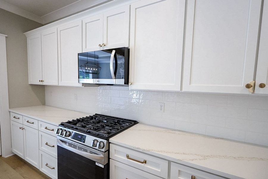 Furnished interior view inside a new home in Baker Road, Birchwood (Image 8).