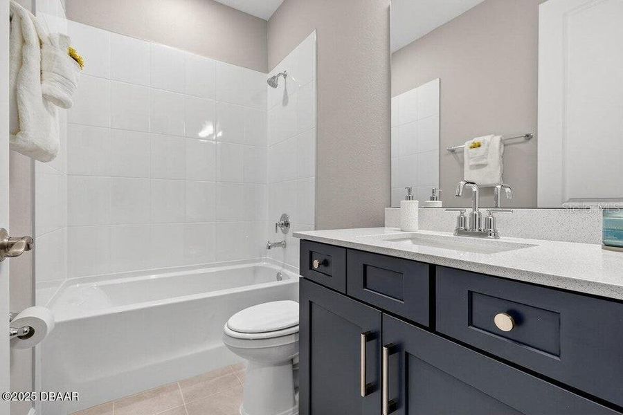 Furnished interior view inside a new home in Legends Preserve - Reserve Series, Daytona Beach (Image 9). Furnished interior view inside a new home in Legends Preserve - Reserve Series, Daytona Beach (Image 9).