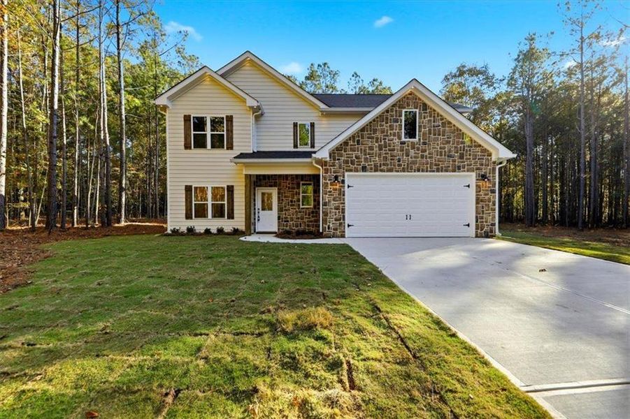 Front exterior of a new home in , Whitesburg, GA, highlighting curb appeal (Image 24).