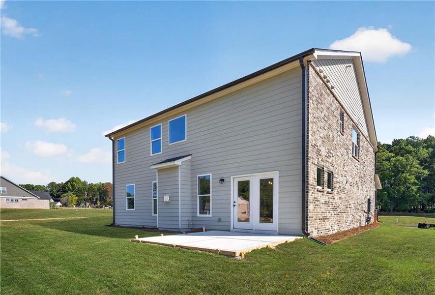 Exterior details and patio area of a home in , Loganville (Image 33).