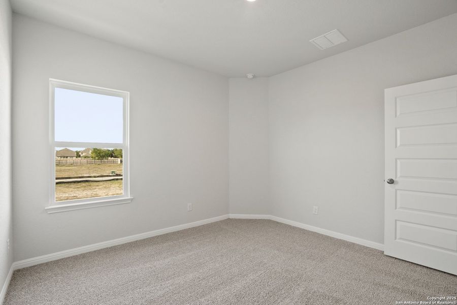 Spacious, unfurnished interior of a new home in Melissa Ranch, San Antonio (Image 13).