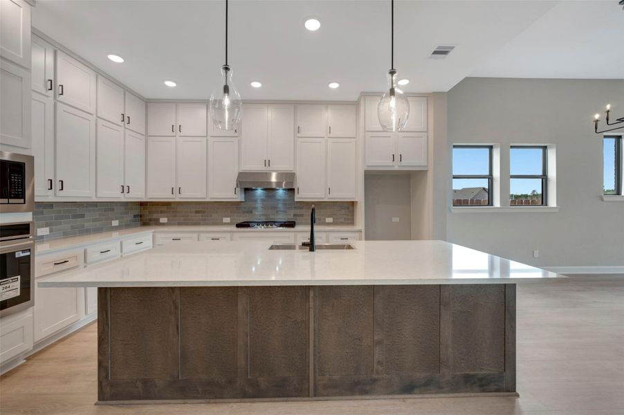 Furnished interior view inside a new home in COLTON - Reserve Collection, Todd Mission (Image 9).