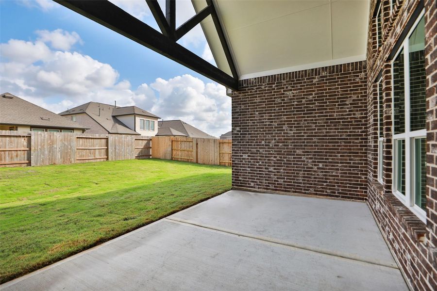 Exterior details and patio area of a home in Brookewater, Rosenberg (Image 2). Exterior details and patio area of a home in Brookewater, Rosenberg (Image 2).