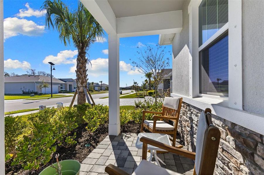 Exterior details and patio area of a home in Windwater, Parrish (Image 21).