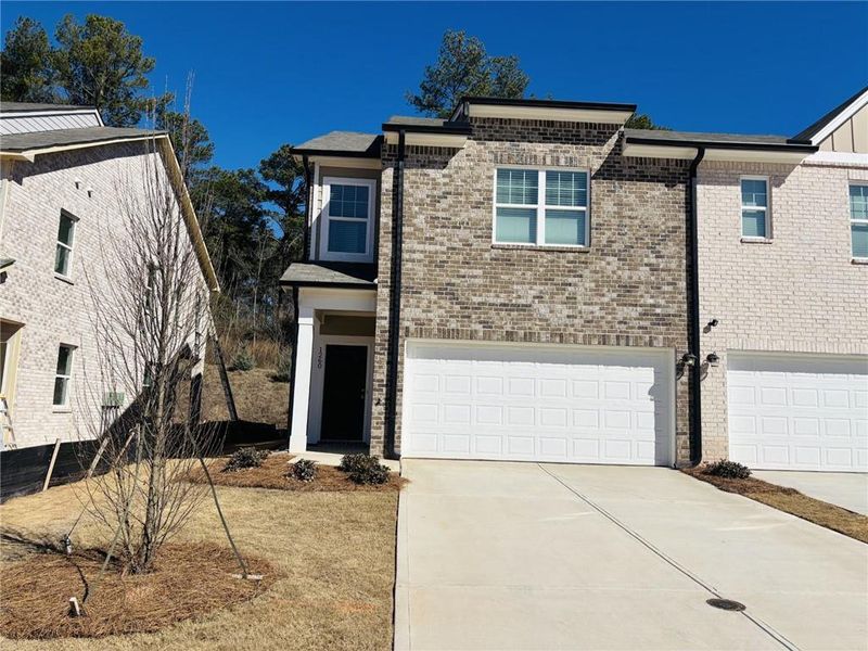 Front exterior of a new home in Kendall Grove, McDonough, GA, highlighting curb appeal (Image 10).