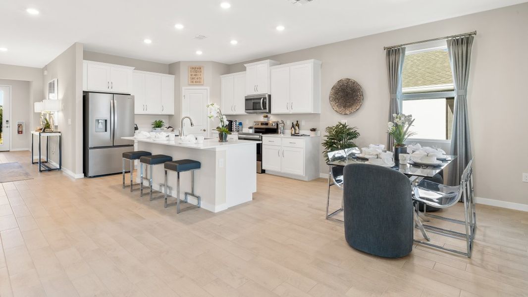 Representative furnished interior of a home built from the Lantana by D.R. Horton in Cove at West Port - Tradition, Port Charlotte (Image 9). Representative furnished interior of a home built from the Lantana by D.R. Horton in Cove at West Port - Tradition, Port Charlotte (Image 9).