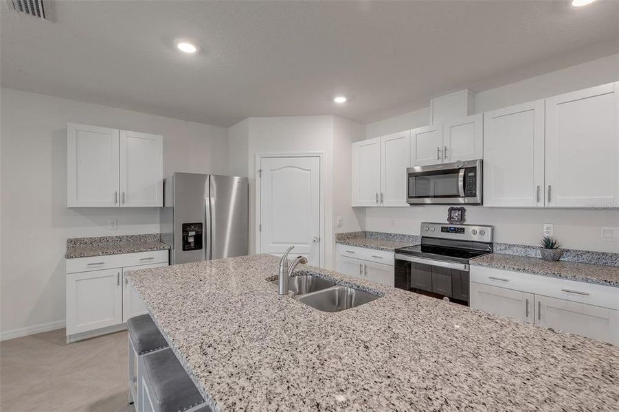 Furnished interior view inside a new home in Groveside at Ormond Station, Ormond Beach (Image 12).