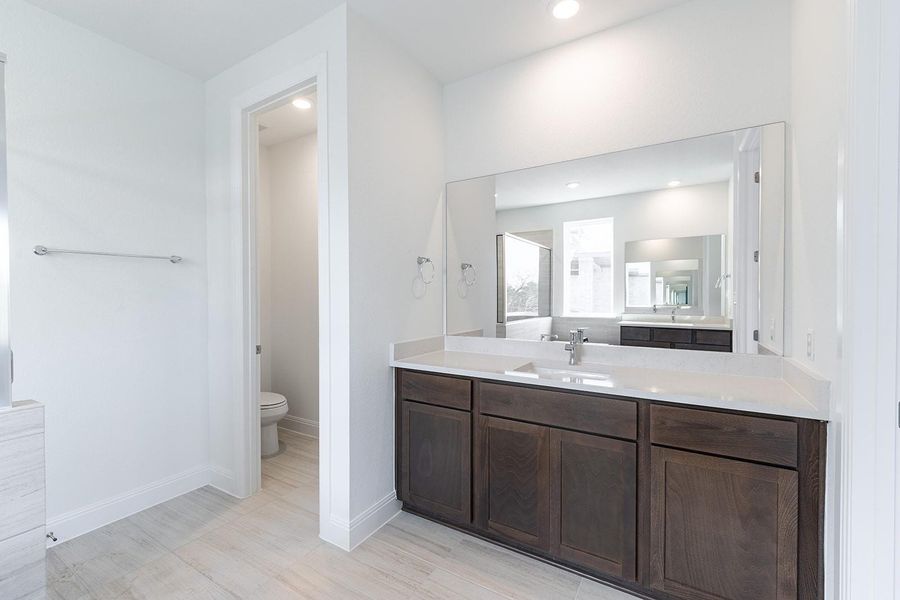 Furnished interior view inside a new home in The Colony - 50', Bastrop (Image 16).