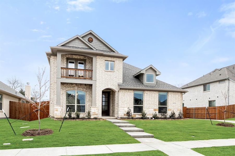 Front exterior of a new home in Ridgepoint, Midlothian, TX, highlighting curb appeal (Image 26).