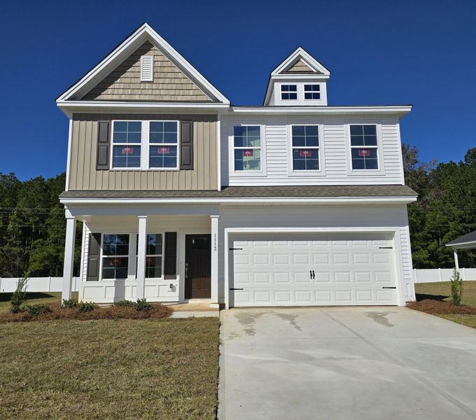 Front exterior of a new home in Hainer Place, Conway, SC, highlighting curb appeal (Image 1).