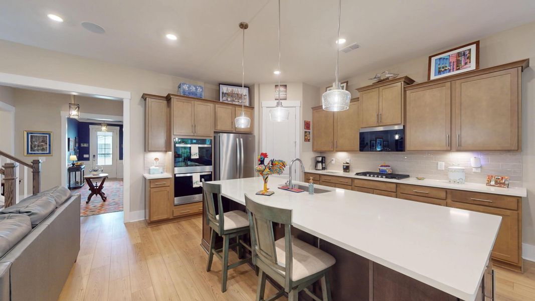 Furnished interior view inside a new home in Summerwind Crossing at Lakes of Cane Bay, Summerville (Image 40).
