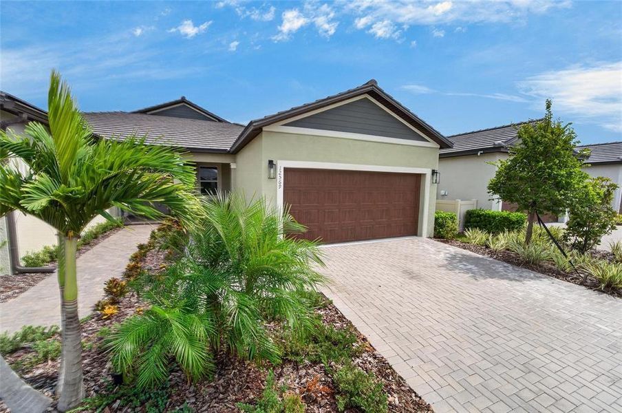 Front exterior of a new home in , Parrish, FL, highlighting curb appeal (Image 26).