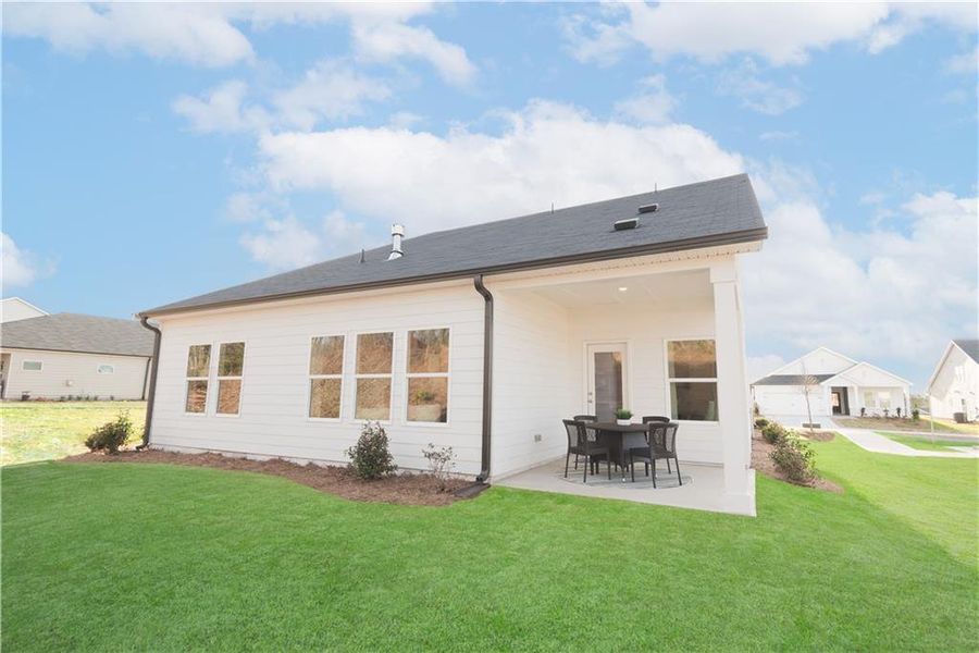 Exterior details and patio area of a home in Westmont Preserve, Powder Springs (Image 2).