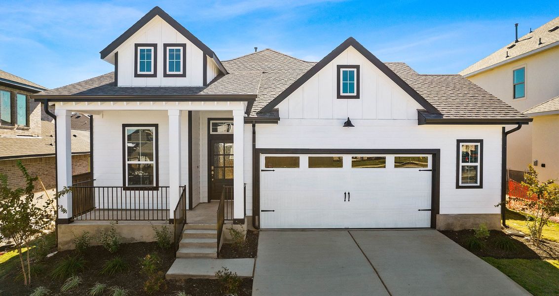 Front exterior of a new home in Nolina, Georgetown, TX, highlighting curb appeal (Image 24).