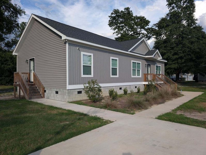 Exterior details and patio area of a home in , Walterboro (Image 20).