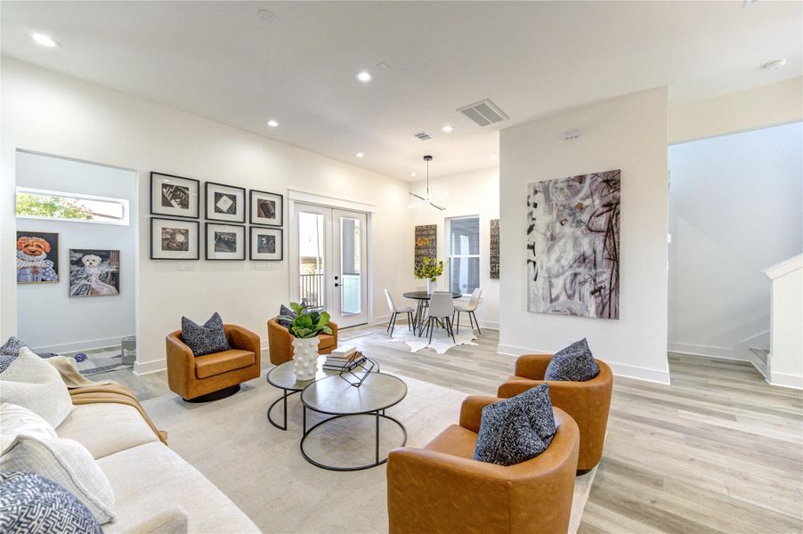 Living area offers flexible space suitable for a pet area or home office.