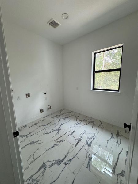 Spacious, unfurnished interior of a new home in , Humble (Image 18).