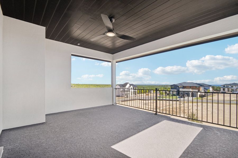 Exterior details and patio area of a home in Milky Way at River Place, Austin (Image 27).