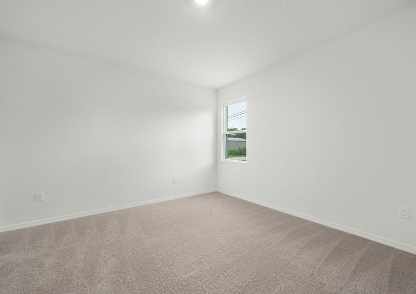 The master bedroom is spacious and has a walk in closet and bathroom attached