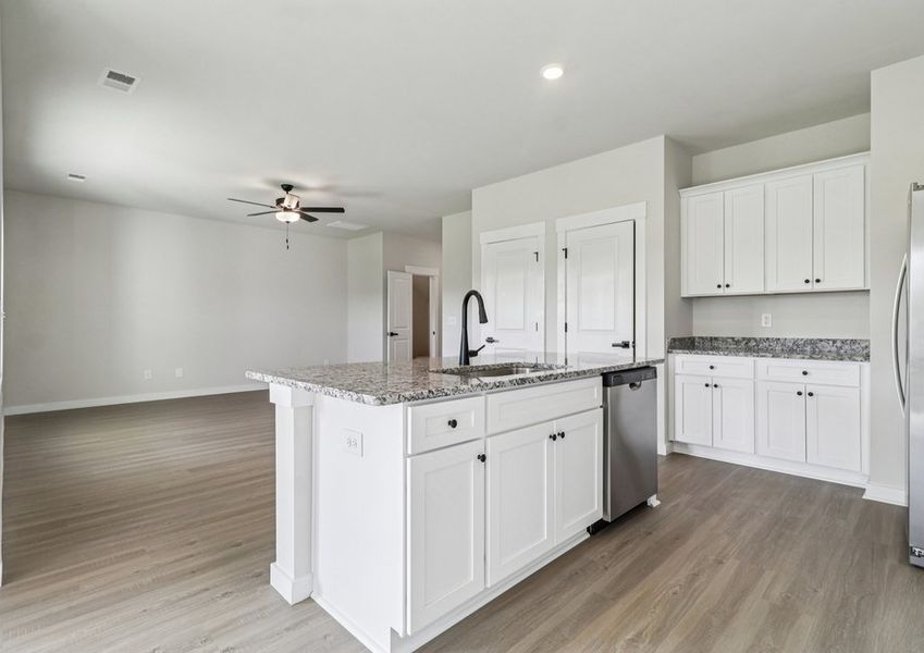 The kitchen is open to the living area