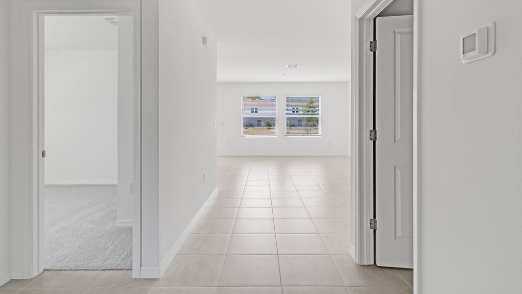 Representative unfurnished interior of a home built from the Ambrosia by Taylor Morrison in Aden South at Westview, Kissimmee (Image 13).