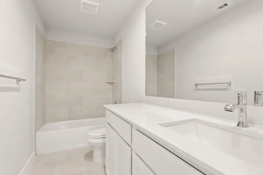 Furnished interior view inside a new home in Barton Creek Ranch, Conroe (Image 9). Furnished interior view inside a new home in Barton Creek Ranch, Conroe (Image 9).