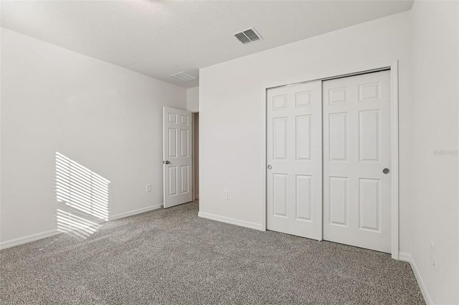 Spacious, unfurnished interior of a new home in Lawson Dunes - Signature Series, Haines City (Image 23). Spacious, unfurnished interior of a new home in Lawson Dunes - Signature Series, Haines City (Image 23).