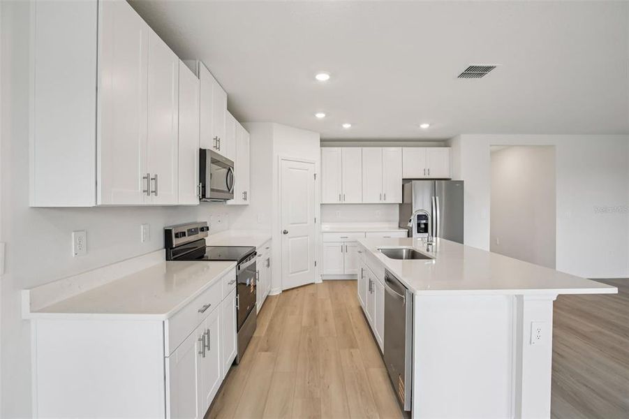 Furnished interior view inside a new home in Two Rivers - Classic Series, Zephyrhills (Image 5).