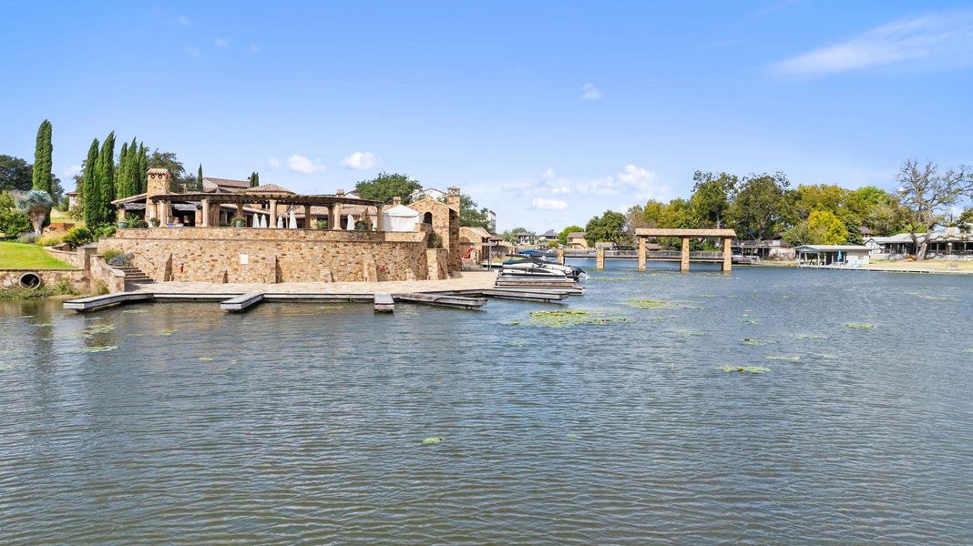 Water view featuring a floating dock