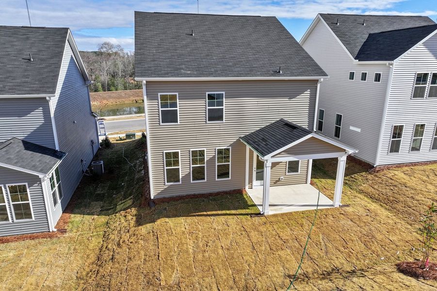 Exterior details and patio area of a home in Renaissance at White Oak, Garner (Image 20).