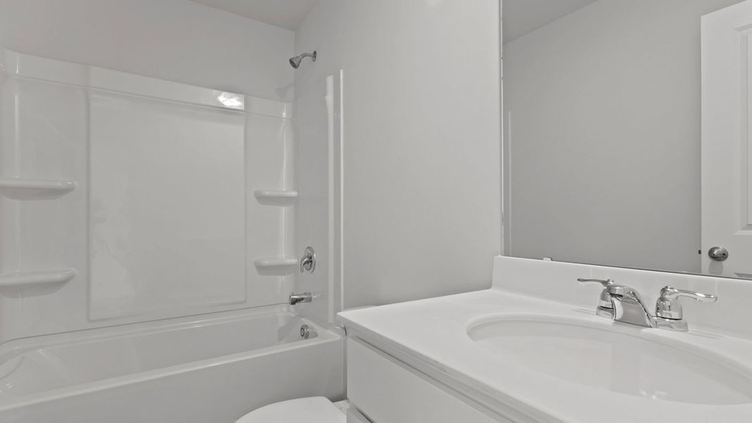 Representative furnished interior of a home built from the BRANDON by D.R. Horton in Center Pointe, Santee (Image 8).