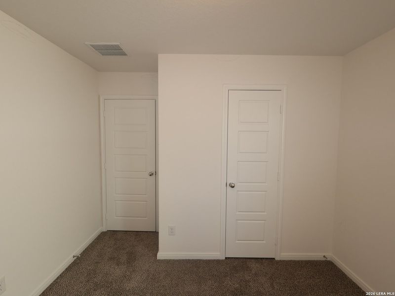 Spacious, unfurnished interior of a new home in Hunters Ranch, San Antonio (Image 28).