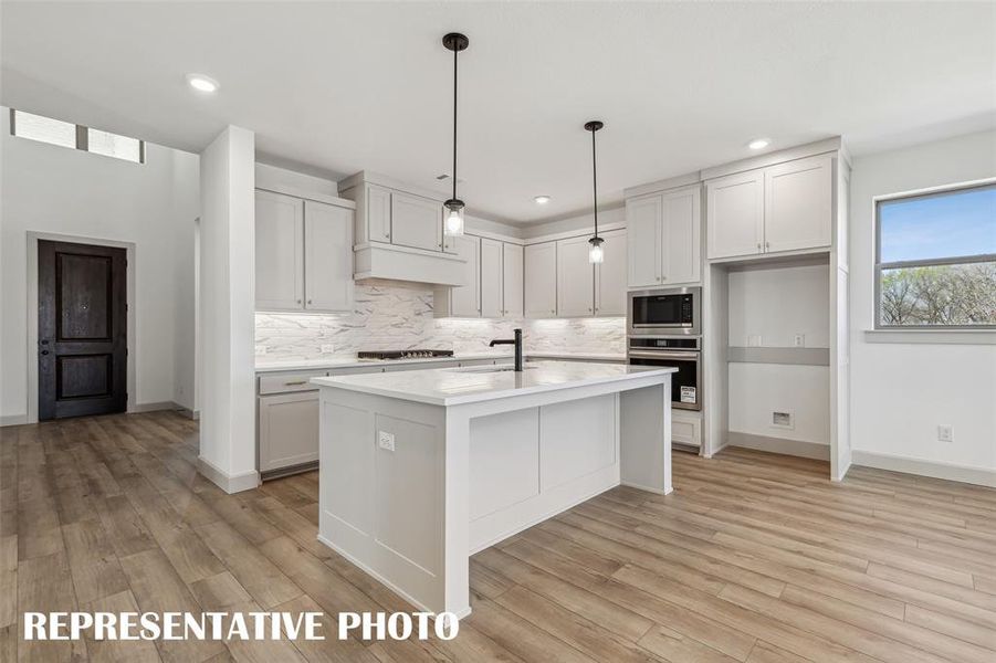 Let your culinary adventure begin in this chef's dream kitchen!  REPRESENTATIVE PHOTO