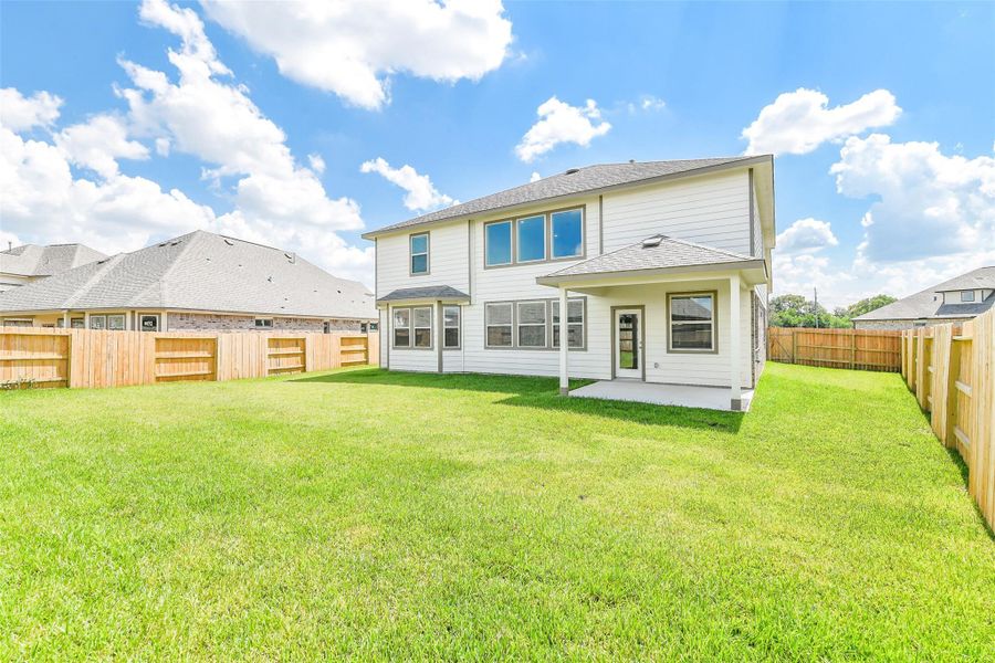 Front exterior of a new home in Stone Creek Ranch, Hockley, TX, highlighting curb appeal (Image 1). Front exterior of a new home in Stone Creek Ranch, Hockley, TX, highlighting curb appeal (Image 1).