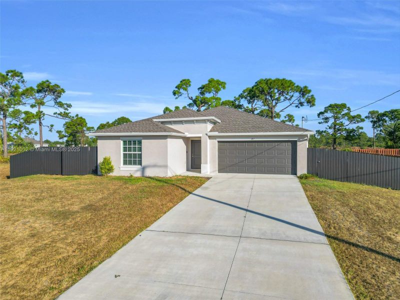 Front exterior of a new home in , Cape Coral, FL, highlighting curb appeal (Image 2). Front exterior of a new home in , Cape Coral, FL, highlighting curb appeal (Image 2).