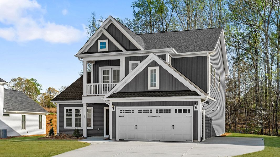 Front exterior of a new home in Fieldstone, Lexington, NC, highlighting curb appeal (Image 25).
