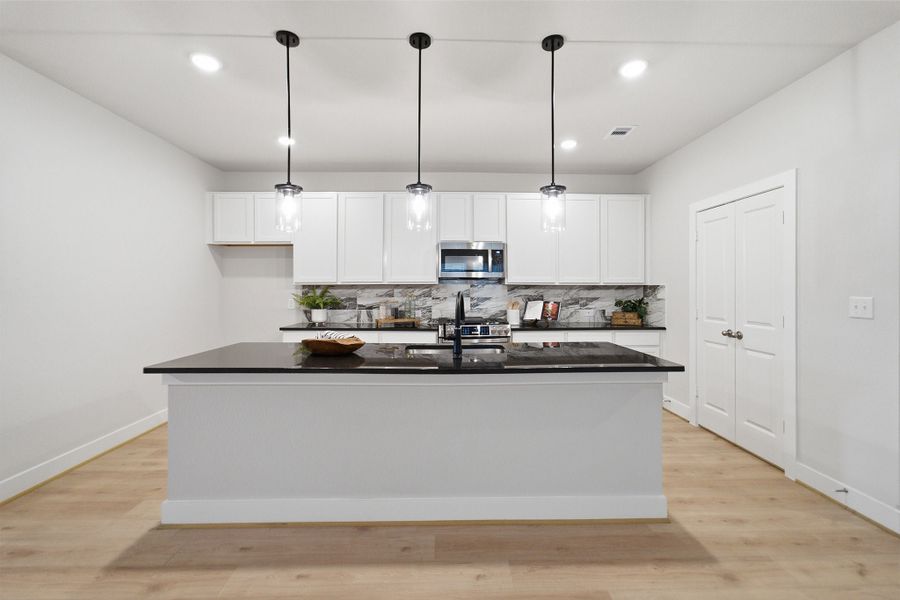 Furnished interior view inside a new home in Massey Oaks, Pearland (Image 6).