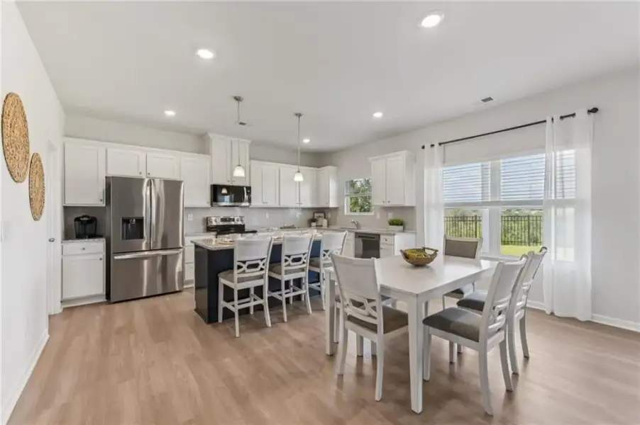 Furnished interior view inside a new home in The Hills at Cedar Creek, Winder (Image 31).
