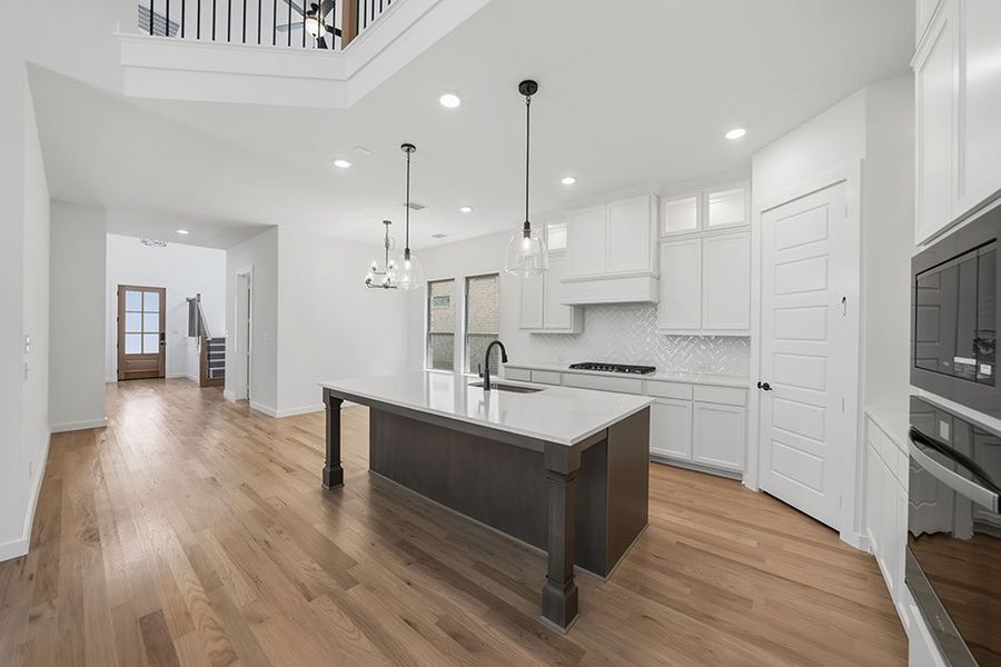 Furnished interior view inside a new home in Light Farms Brenham - 40' Lots, Celina (Image 10).