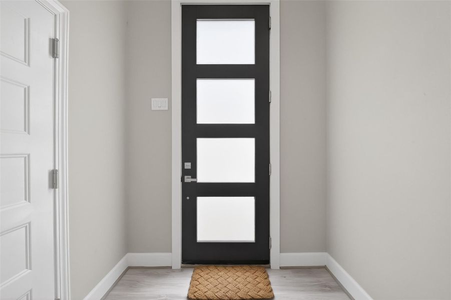 Entry with garage access to the left Entry with garage access to the left