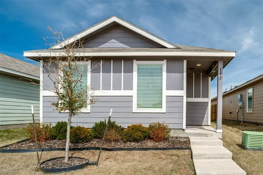 Front exterior of a new home in Tillage Farms, Princeton, TX, highlighting curb appeal (Image 1). Front exterior of a new home in Tillage Farms, Princeton, TX, highlighting curb appeal (Image 1).