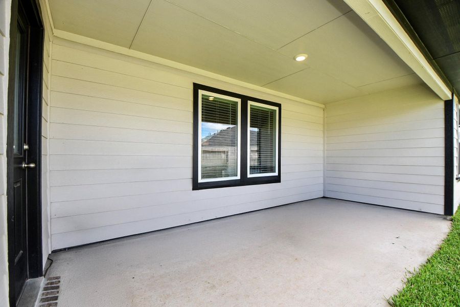 Covered patio offering an inviting atmosphere perfect for cooking and entertaining outdoors.