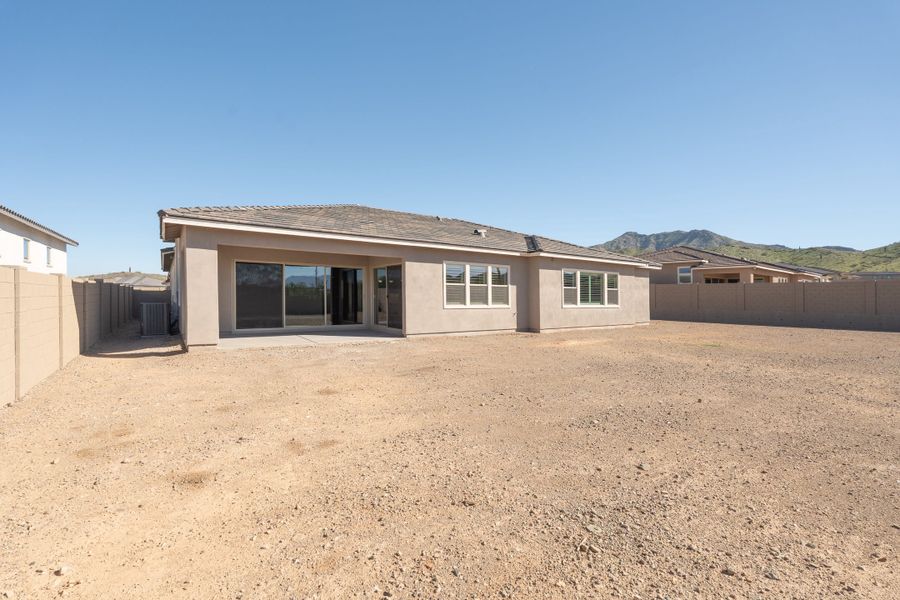 Exterior details and patio area of a home in Whispering Hills, Laveen (Image 3).
