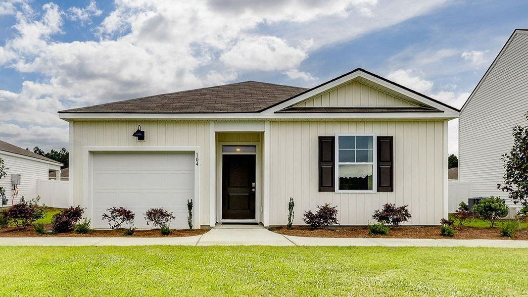 Front exterior of a new home in The Retreat at East Argent, Ridgeland, SC, highlighting curb appeal (Image 1).