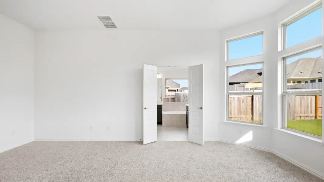 Furnished interior view inside a new home in Sunfield, Buda (Image 11).