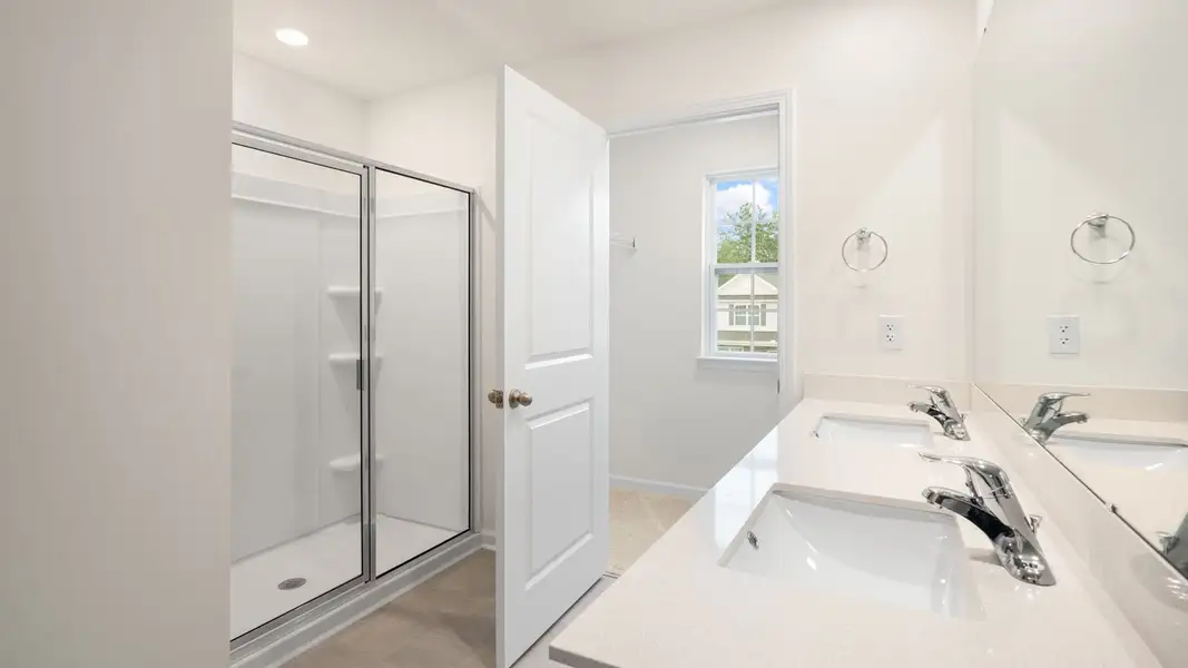 Furnished interior view inside a new home in The Reserve at Prestleigh, Wake Forest (Image 11).