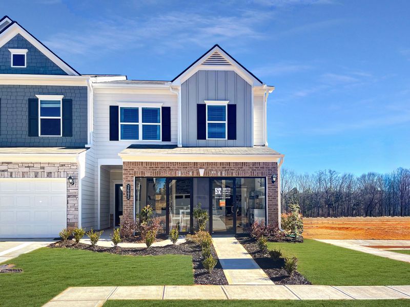 Front exterior of a new home in Sanders Park, Austell, GA, highlighting curb appeal (Image 1).
