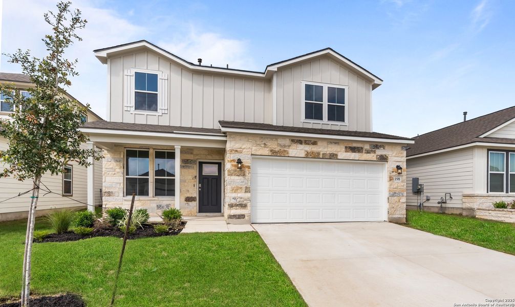 Front exterior of a new home in The Meadows at Hunters Ranch, San Antonio, TX, highlighting curb appeal (Image 19).