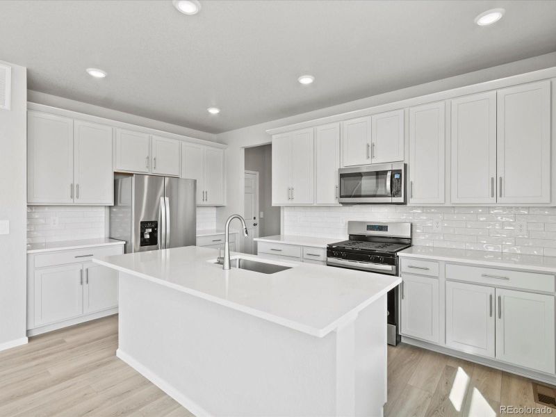 Furnished interior view inside a new home in Revere at Johnstown, Johnstown (Image 11).